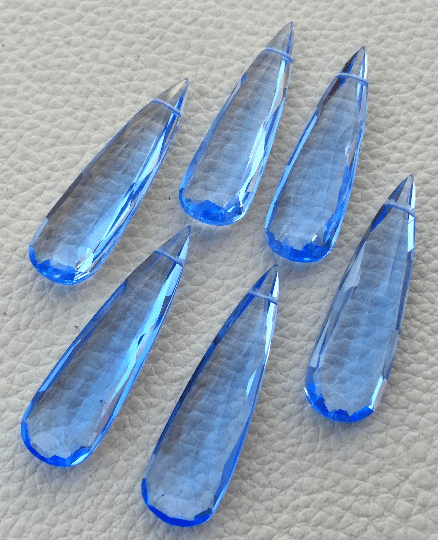 BRAND NEW, Superb Amazing Matched Pair, 35mm Long, TANZANITE Blue Quartz Elongated Pear pair.Low Price