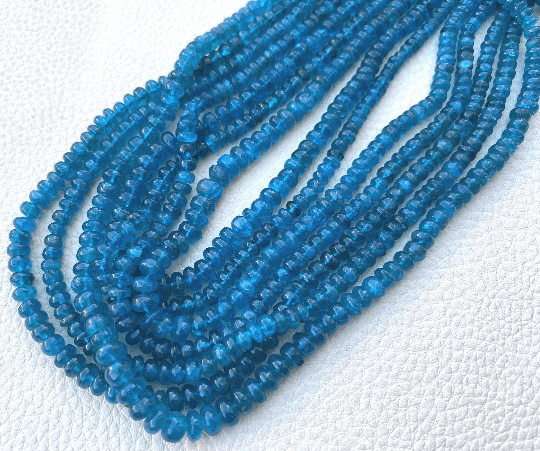 Brand New, Full 14 Inch Full Strand,Natural NEON BLUE APATITE Smooth Rondelles Beads,5-4mm Size, Amazing Item at Low Price.