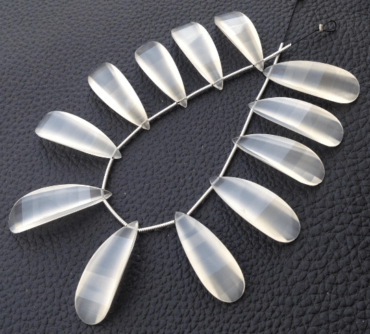 AMAZING,Brand New, 2 Matched Pairs, 30mm Long, WHITE Chalcedony Elongated Curved Pear Briolettes,Amazing Item at Low Price
