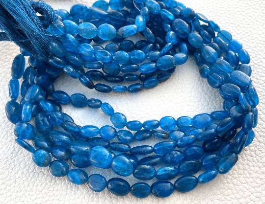 Brand New, Full 14 Inch Full Strand,Natural NEON BLUE APATITE Smooth Oval Beads, 8-7mm Size, Amazing Item at Low Price.