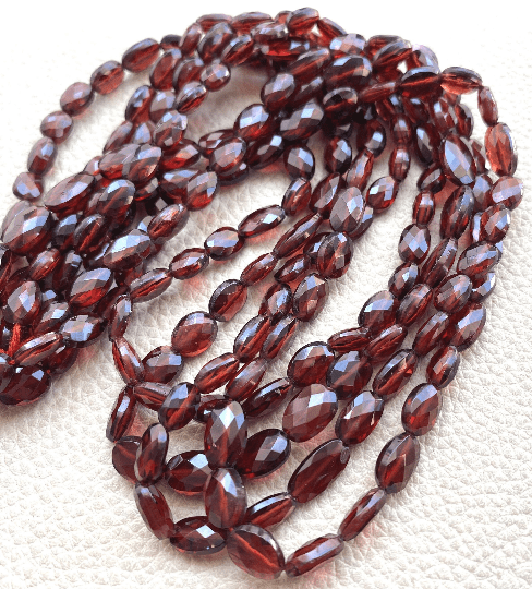 Brand New, Natural Mozambique Garnet Faceted Ovals shape Briolettes, 9-6mm size,Full 8 Inch Long Strand.Amazing Item at Low Price